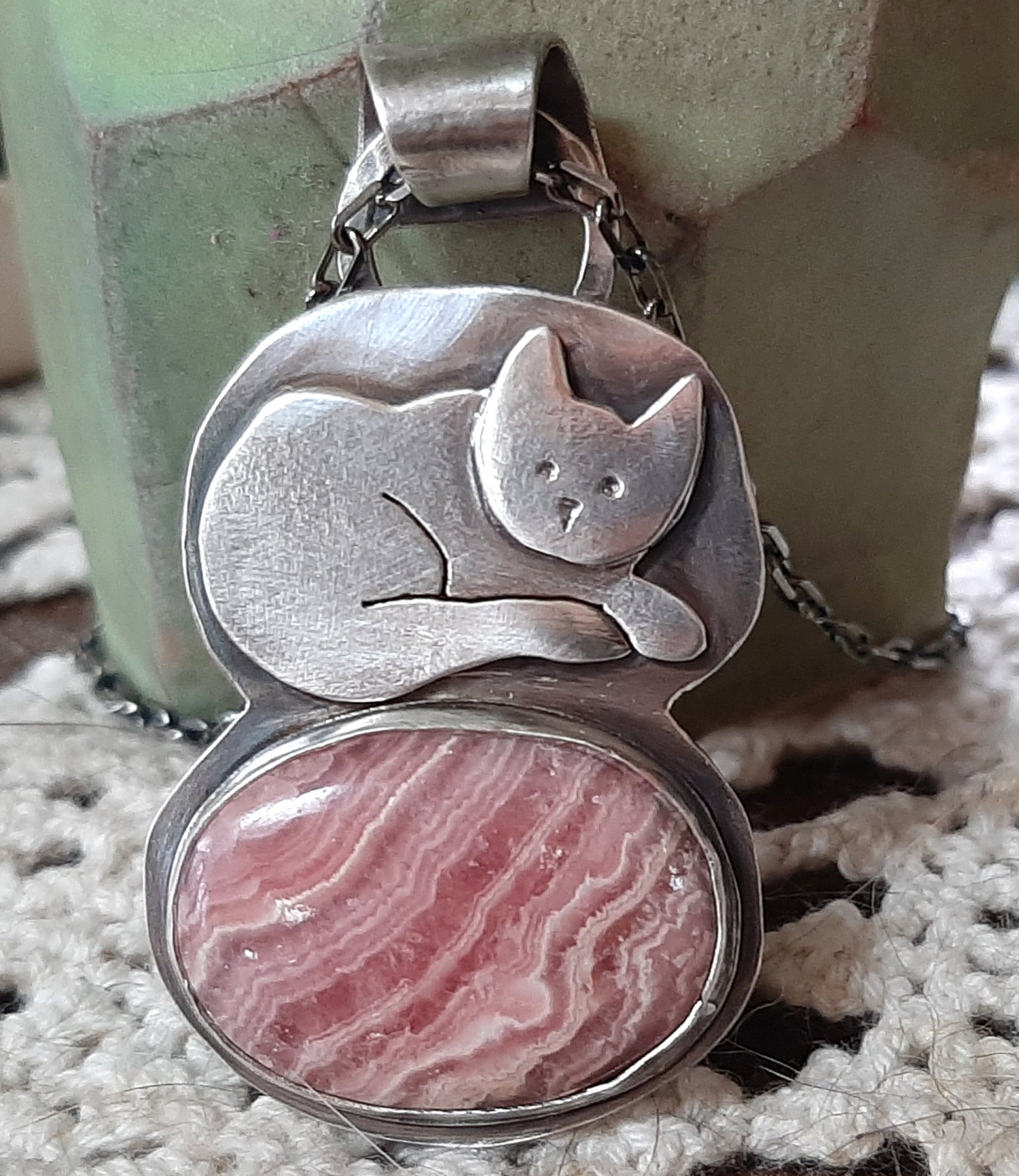 Rhodochrosite Cat Necklace handcrafted from sterling silver Sleepy Cat Jewelry